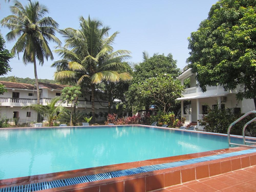 Hotel Riverside Baga Esterno foto
