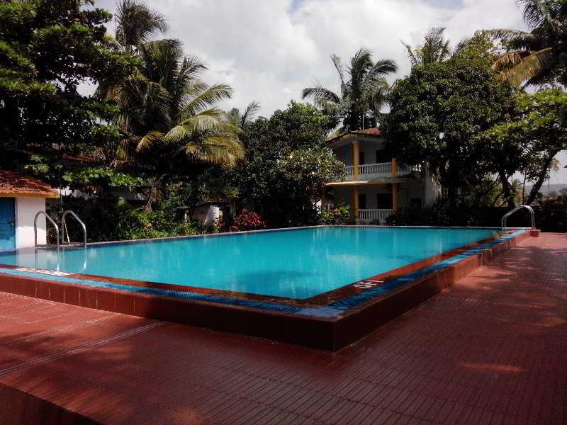 Hotel Riverside Baga Esterno foto